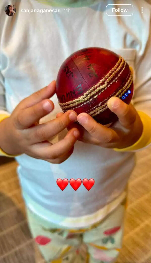Image of Jasprit Bumrah's son holding a cricket ball