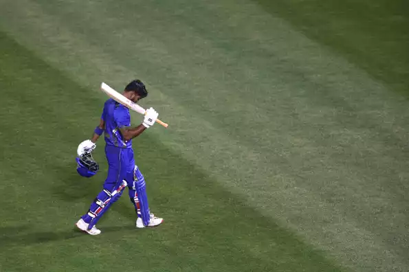 Monank Patel smashes a boundary during his impressive innings