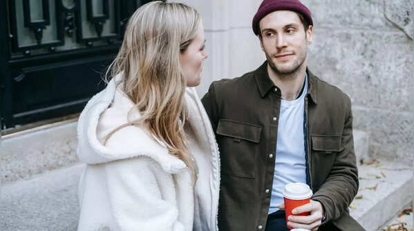 Woman looking at her partner who is walking away.